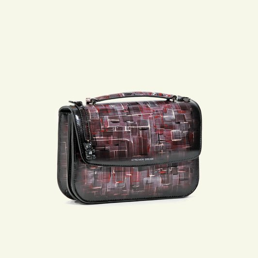 Tori bag in airbrushed leather "Our own bouclè in burgundy"