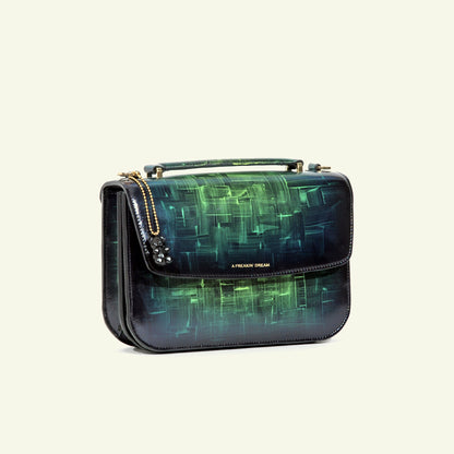 Tori bag in airbrushed leather "Our own bouclè in green"