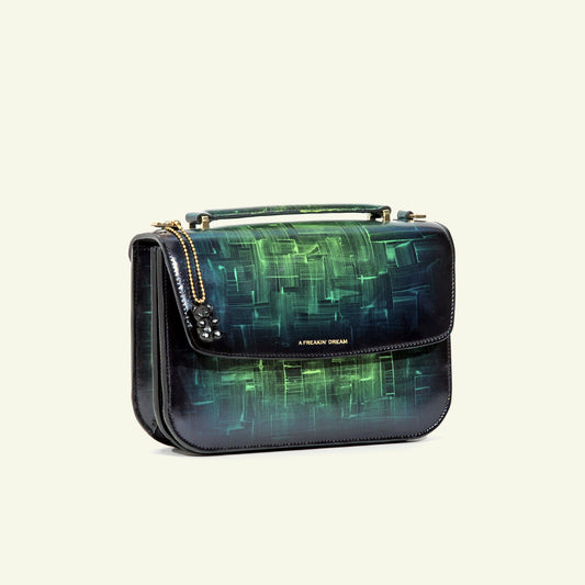Tori bag in airbrushed leather "Our own bouclè in green"